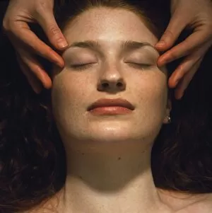 Stress Relief Gallery: Woman receives a facial massage