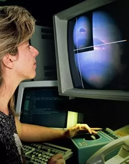 Images Dated 21st July 2003: Woman using image processing data from Voyage 11