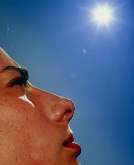 Images Dated 21st May 2003: Womans face with sun