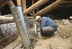 Construction Worker At Work Prints: Worker installing ventilation