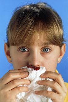 Young girl with a nosebleed Young girl with a nosebleed