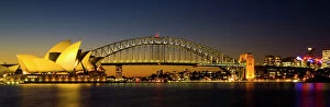 Land Mark Collection: Australia, New South Wales, Sydney. Sydney Harbour bridge and the opera house viewed at dusk