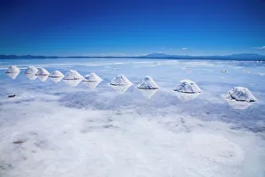 Bolivia, Southern Altiplano, Salar de Uyuni. Cones of salt stacked on the Salar de Uyuni Bolivia, Southern Altiplano, Salar de Uyuni. Cones of salt stacked on the Salar de Uyuni