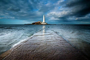 Tide Gallery: England, Tyne and Wear, Whitley Bay. Incoming tide engulfs the causeway linking St Marys Island & lifehouse to
