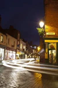 Prints of England, Lincolnshire, Lincoln. Traffic at dusk along Eastgate in the historic UK city of Lincoln Lincoln Prints: Lincolnshire Print: Dusk on Eastgate