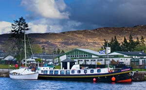 Inverness Collection: Scotland, Scottish Highlands, Fort Augustus. Tourist sight seeing barge moored on the Caledonian