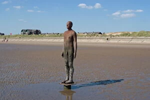 Merseyside Gallery: One of the 100 men of Another Place, also known as The Iron Men, statues by Antony Gormley