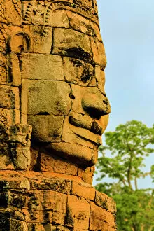 Cambodia Collection: One of 216 smiling sandstone faces at 12th century Bayon, King Jayavarman VIIs last