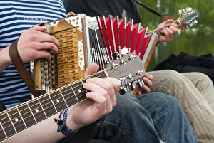 Accordion and guitar, ethnic group of musicians, River Emajogi, Tartu, Estonia, Baltic States, Europe Accordion and guitar, ethnic group of musicians, River Emajogi, Tartu, Estonia, Baltic States, Europe