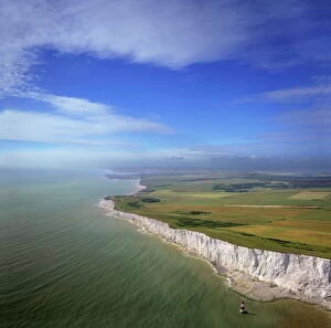 Aerial image of chalk cliffs and lighthouse at Beachy Head, near Eastbourne