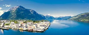 Aerial panoramic by drone of Andalsnes town and fjord, Rauma municipality, More og