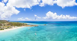 Aerial panoramic by drone of boats in the blue Caribbean Sea approaching to Turners Beach Aerial panoramic by drone of boats in the blue Caribbean Sea approaching to Turners Beach