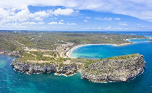 Aerial panoramic by drone of cliffs surrounding Half Moon Bay washed by Caribbean Sea Aerial panoramic by drone of cliffs surrounding Half Moon Bay washed by Caribbean Sea