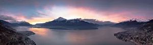 Aerial panoramic view of Gravedona and Domaso towns on shores of Lake Como at sunrise Aerial panoramic view of Gravedona and Domaso towns on shores of Lake Como at sunrise