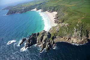 Images Dated 21st June 2011: Aerial photo of Treen Cliff and Porthcurno beach looking west to the Minnack Theatre