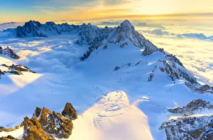 Aerial view of the Grand Jorasses at sunrise, Mont Blanc massif, Courmayeur, Aosta Valley Aerial view of the Grand Jorasses at sunrise, Mont Blanc massif, Courmayeur, Aosta Valley