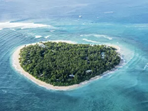 Atoll Gallery: Aerial view of the heart-shaped island of Tavarua, near Viti Levu, Republic of Fiji