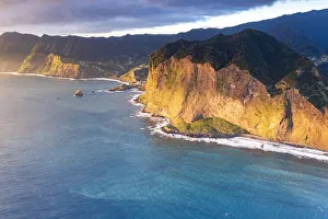 Aerial view of majestic cliffs and coastline at sunrise from Guindaste viewpoint, Faial Aerial view of majestic cliffs and coastline at sunrise from Guindaste viewpoint, Faial