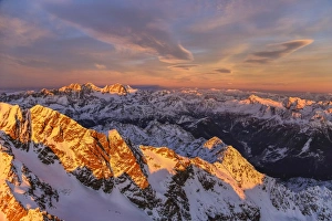 Aerial view of Mount Disgrazia and Bernina Group at sunset, Masino Valley, Valtellina Aerial view of Mount Disgrazia and Bernina Group at sunset, Masino Valley, Valtellina