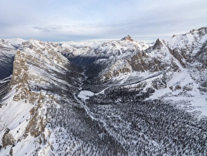 Aerial view of rocky peaks of Val Padeon and snowy woods, Cortina d'Ampezzo, Province of Belluno Aerial view of rocky peaks of Val Padeon and snowy woods, Cortina d'Ampezzo, Province of Belluno