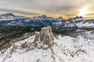 Aerial view of the snowy ridges of the Cinque Torri at dawn, Dolomites, Cortina d'Ampezzo Aerial view of the snowy ridges of the Cinque Torri at dawn, Dolomites, Cortina d'Ampezzo