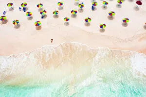 Aerial view of woman sunbathing on a tropical beach, Antigua, West Indies, Caribbean, Central America