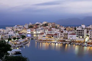 Agios Nikolaos old town with lake in its centre at dusk, Lasithi prefecture, Crete Agios Nikolaos old town with lake in its centre at dusk, Lasithi prefecture, Crete