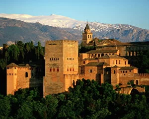 Images Dated 8th April 2008: The Alhambra Palace, UNESCO World Heritage Site, with the snow covered Sierra Nevada mountains in