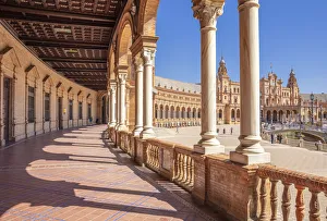 Under the arches of the semicircular Plaza de Espana, Maria Luisa Park, Seville, Andalusia Under the arches of the semicircular Plaza de Espana, Maria Luisa Park, Seville, Andalusia