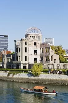 Images Dated 26th November 2009: Atomic Bomb Dome, UNESCO World Heritage Site, and boat on Aioi river, Hiroshima