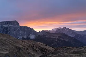 Autumn sunrise over Marmolada and Sass Pordoi from Passo Sella, Val Gardena, Dolomites Autumn sunrise over Marmolada and Sass Pordoi from Passo Sella, Val Gardena, Dolomites
