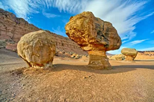 Balanced boulders at the base of Vermilion Cliffs in Glen Canyon Recreation Area, Arizona Balanced boulders at the base of Vermilion Cliffs in Glen Canyon Recreation Area, Arizona