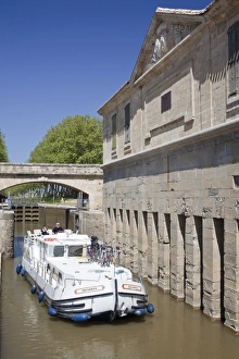 A barge on the Canal du Midi, UNESCO World Heritage Site, in spring, Languedoc-Roussillon A barge on the Canal du Midi, UNESCO World Heritage Site, in spring, Languedoc-Roussillon