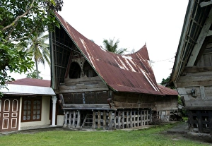 Batak Toba tribal rural village houses with contemporary extensions on Samosir Island in Batak Toba tribal rural village houses with contemporary extensions on Samosir Island in