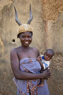 Batammariba mother in a Koutammakou village in North Togo, West Africa, Africa Batammariba mother in a Koutammakou village in North Togo, West Africa, Africa
