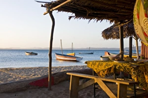 Beach cottage and fishing boats near Diego Suarez (Antsiranana), Madagascar Beach cottage and fishing boats near Diego Suarez (Antsiranana), Madagascar