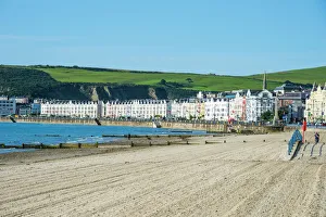 Beach on the seafront of Douglas, Isle of Man, crown dependency of the United Kingdom Beach on the seafront of Douglas, Isle of Man, crown dependency of the United Kingdom