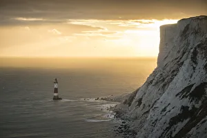 Beachy Head Lighthouse at sunset, East Sussex, England, United Kingdom, Europe Beachy Head Lighthouse at sunset, East Sussex, England, United Kingdom, Europe