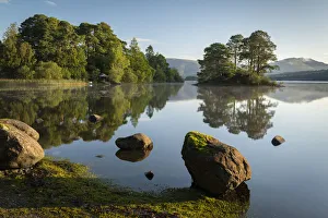 Beautiful morning on a reflection Derwent Water in the Lake District National Park Beautiful morning on a reflection Derwent Water in the Lake District National Park