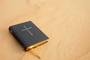 Bible on sand, Dubai, United Arab Emirates, Middle East Bible on sand, Dubai, United Arab Emirates, Middle East
