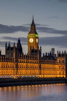 Big Ben Gallery: Big Ben clock tower stands above the Houses of Parliament at dusk, UNESCO World Heritage Site