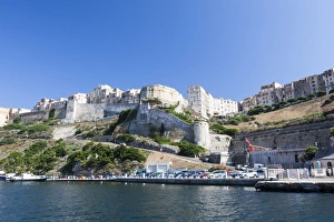 Blue sea frames the medieval old town and fortress, Bonifacio, Corsica, France, Mediterranean Blue sea frames the medieval old town and fortress, Bonifacio, Corsica, France, Mediterranean