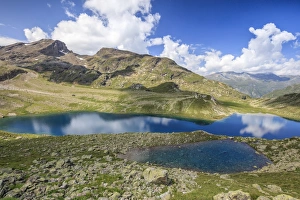 Blue water of alpine lake, Leg Grevasalvas, Julierpass, Maloja, Engadine Blue water of alpine lake, Leg Grevasalvas, Julierpass, Maloja, Engadine