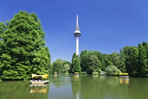 Boat trip at Kutzenweiher Lake, Luisenpark, municipal park, and telecommunication tower Boat trip at Kutzenweiher Lake, Luisenpark, municipal park, and telecommunication tower