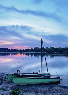 Boat and Vistula River at sunset, Mecmierz near Kazimierz Dolny, Lublin Voivodeship