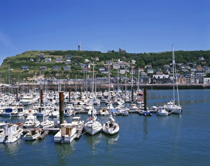 Boats in the harbour with the town in the background, at Fecamp, Haute Normandie Boats in the harbour with the town in the background, at Fecamp, Haute Normandie