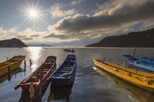 Boats on Lugu Lake, Lige village, Yunnan, China, Asia Boats on Lugu Lake, Lige village, Yunnan, China, Asia