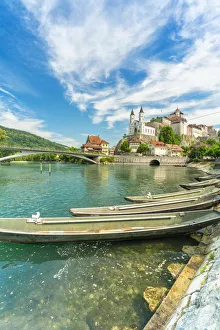 Boats moored in Aare River with Aarburg Castle in background, Aarburg, Canton of Aargau Boats moored in Aare River with Aarburg Castle in background, Aarburg, Canton of Aargau