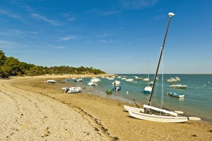 Boats moored in the entrance to Fier d Ars by the beach at La Patache, Les Portes-en-Re Boats moored in the entrance to Fier d Ars by the beach at La Patache, Les Portes-en-Re