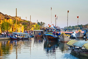 Boats on the Thu Bon River at sunset, Hoi An, Quang Nam Province, Vietnam, Indochina Boats on the Thu Bon River at sunset, Hoi An, Quang Nam Province, Vietnam, Indochina